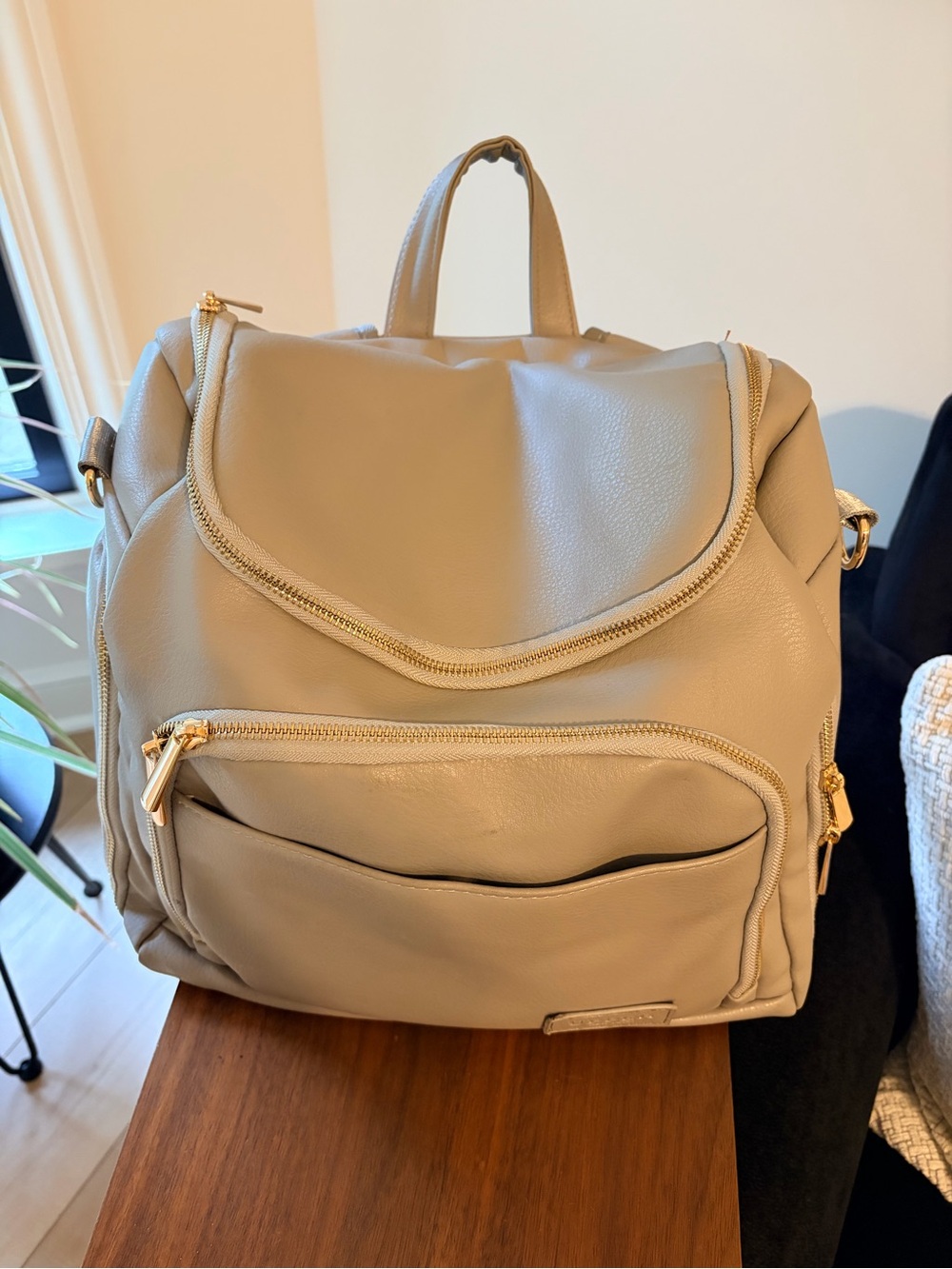 Stylish Cream Baby Bag Backpack with Gold Hardware
